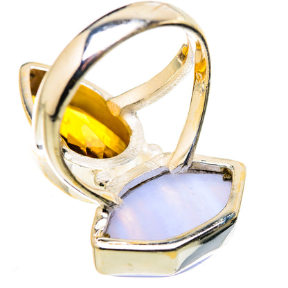 Sterling silver ring with amber oval gemstone, lavender opal-style stone, and prongs