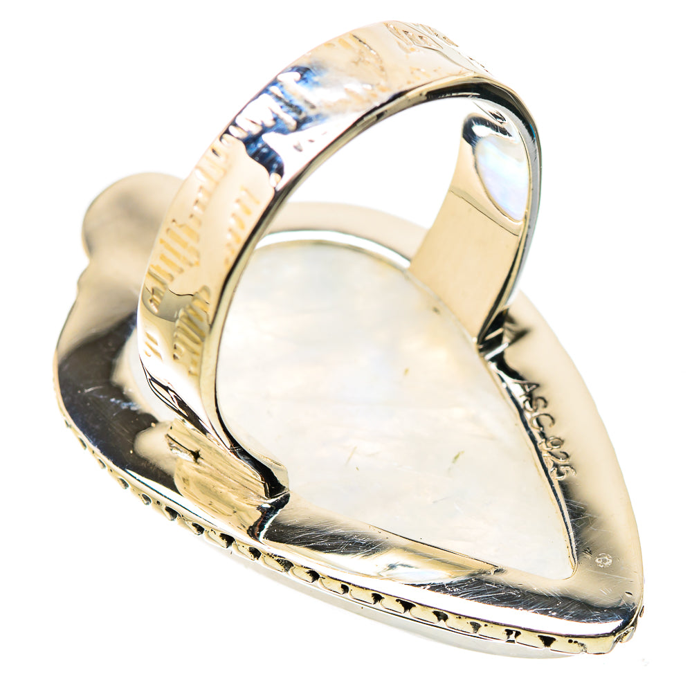 Sterling silver teardrop moonstone ring with beaded bezel and rainbow sheen