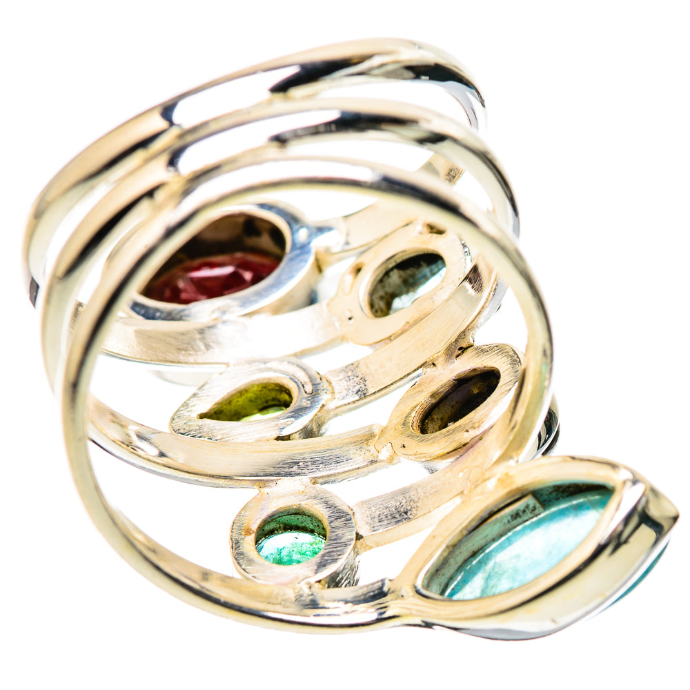 Sterling silver ring with layered metal loops and round stones in red, green, blue
