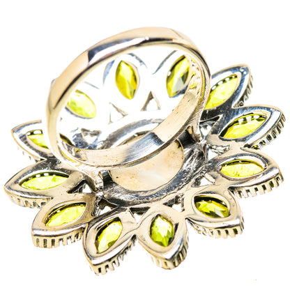 Sterling silver top of ring with round white opal center and yellow-green marquise stones