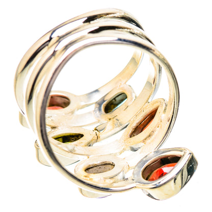 Sterling silver openwork ring with prong-set red, green, and dark blue oval gemstones