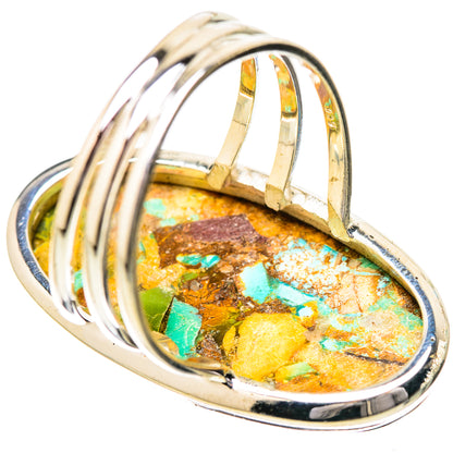 Wide oval turquoise ring in polished sterling silver, gem set with blue-green and gold tones