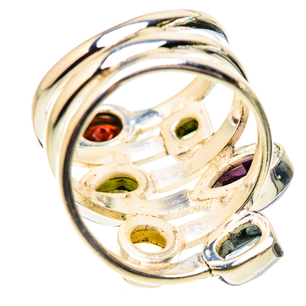 Sterling silver ring band with openwork setting and five colorful stone prongs