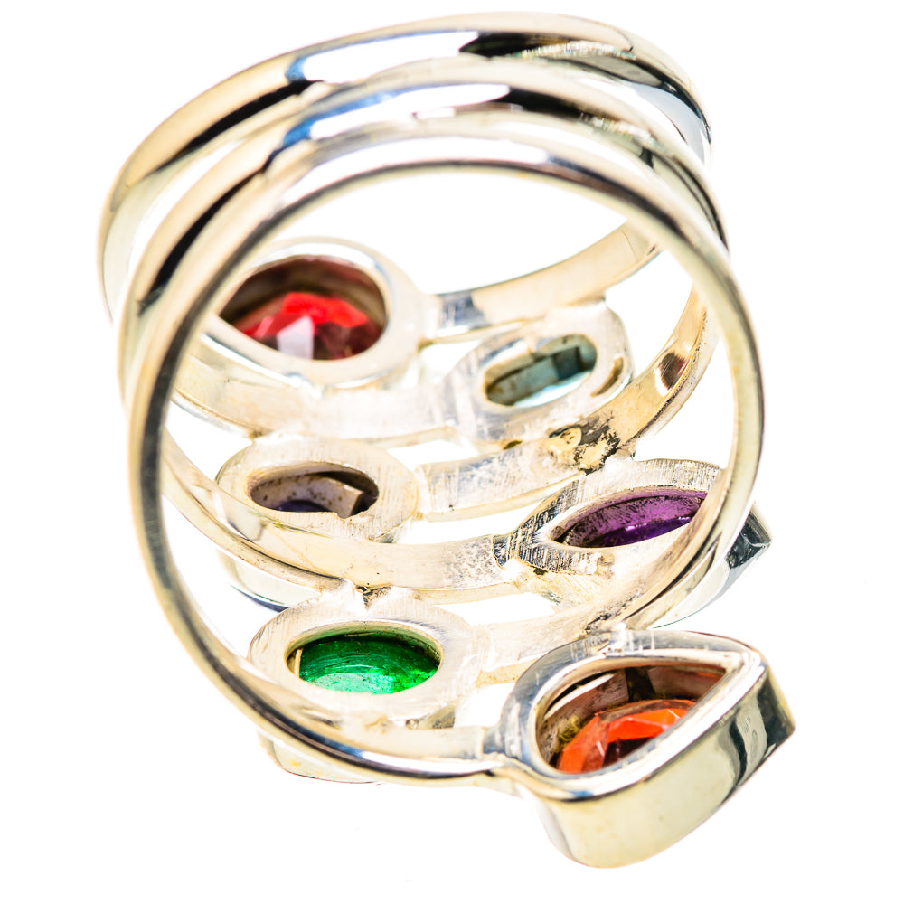Sterling silver openwork ring with oval green onyx, purple stone, and red orange gemstone