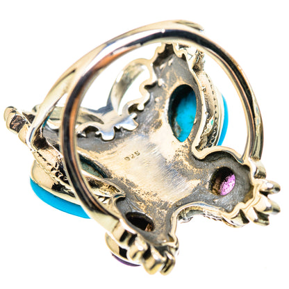 Silver openwork ring with turquoise and amethyst cabochon stones, close-up side