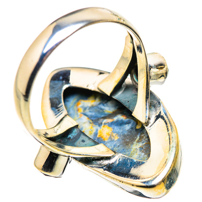 Pietersite ring with open silver sides and black onyx detail around the oval stone