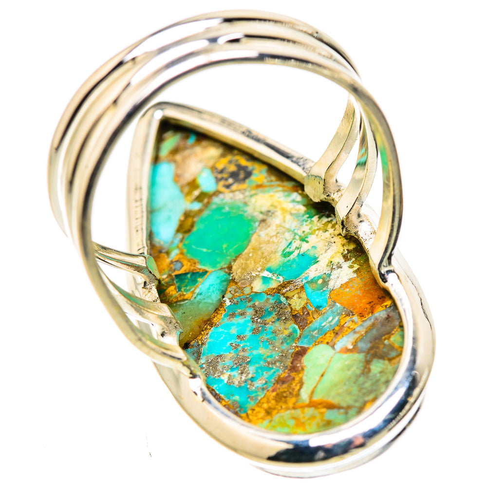 Sterling silver bezel ring with prongs holding oval turquoise stone inlay