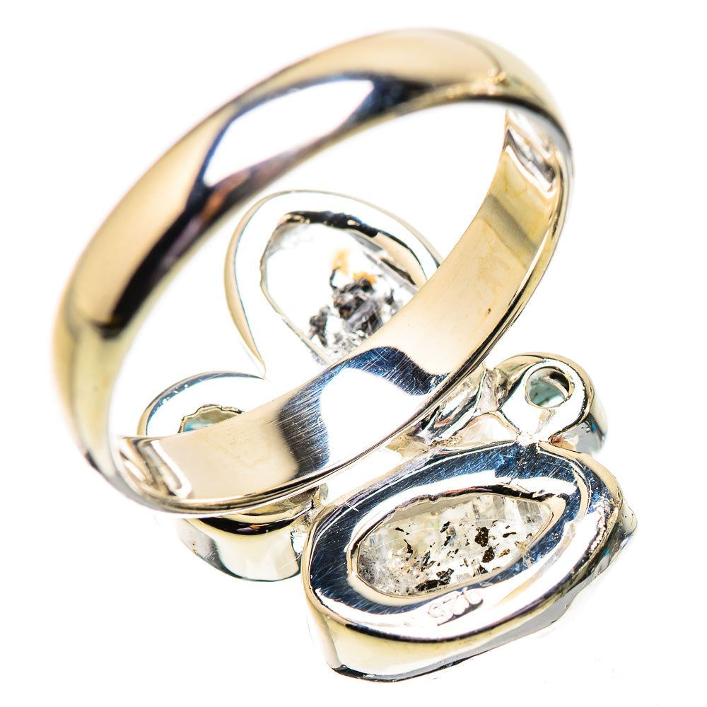 Sterling silver ring with bezel-set herkimer diamonds and small blue topaz accent stones