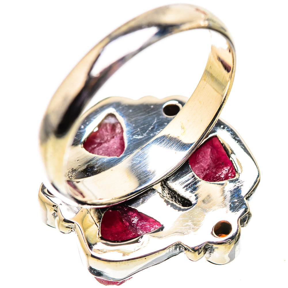 Sterling silver ring band with open setting and rough pink stones, red accents
