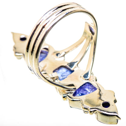 Sterling silver gemstone ring with purple square stone and blue oval cabochon on band