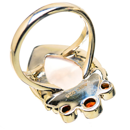 925 sterling silver ring underside with rose quartz mount and garnet prong settings