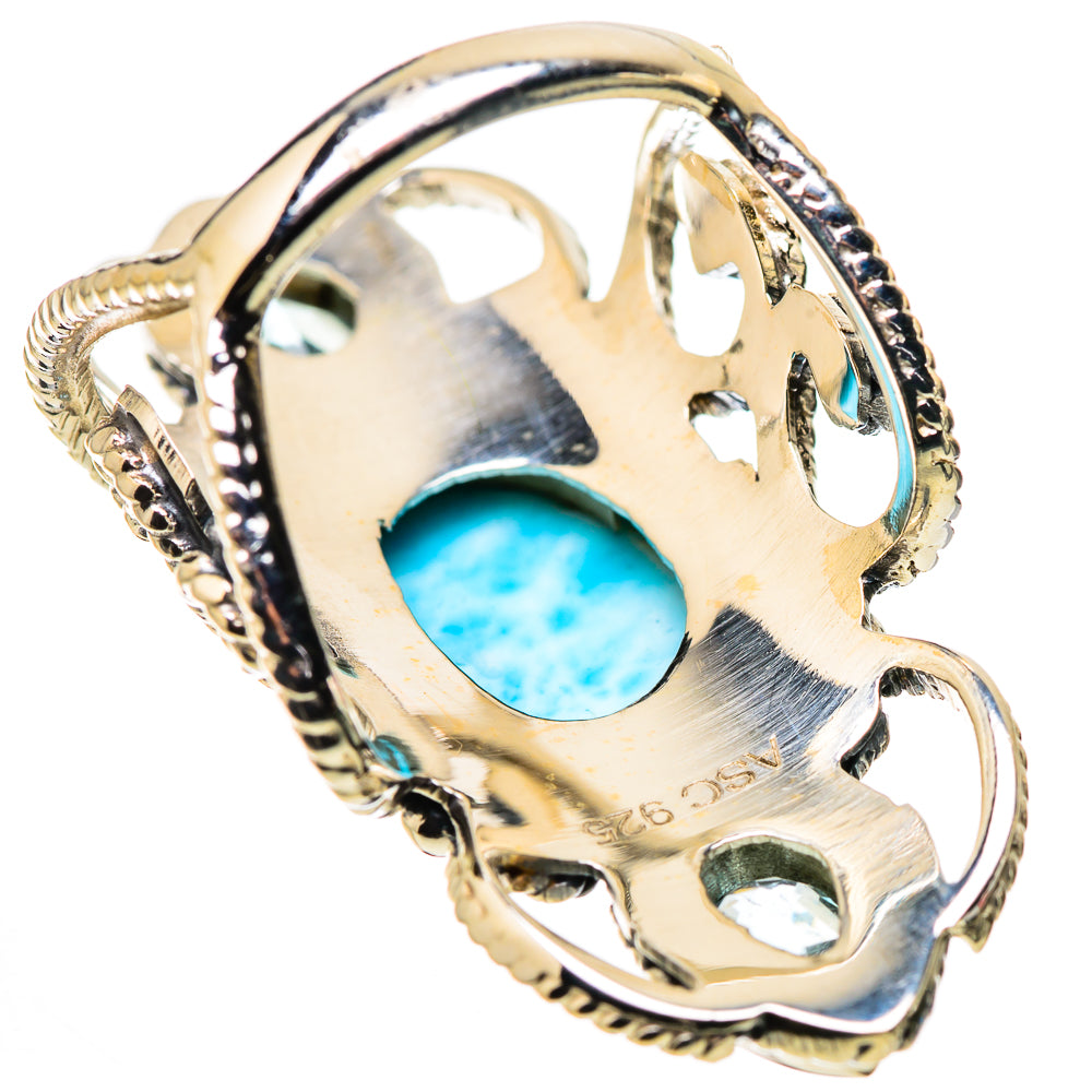 925 sterling silver ring with oval blue center stone and openwork back, small blue gems