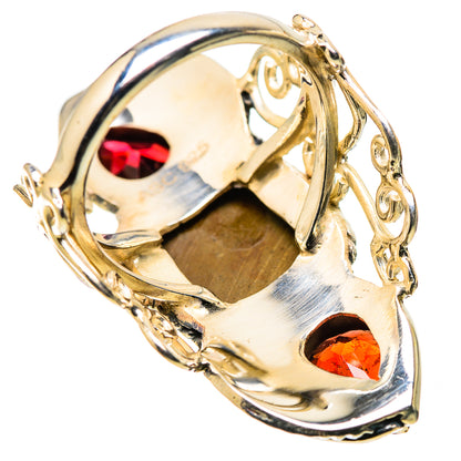 925 sterling silver ring with ammolite center and red garnet stones, open back, size 7.5