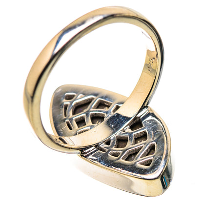 Sterling silver ammolite ring with openwork band and oval bezel
