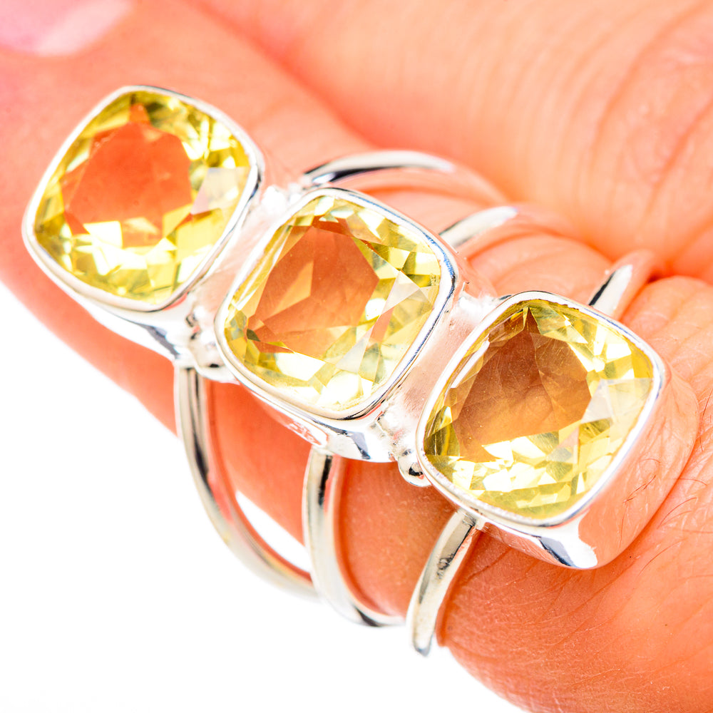 Sterling silver citrine ring with three faceted oval stones, polished band