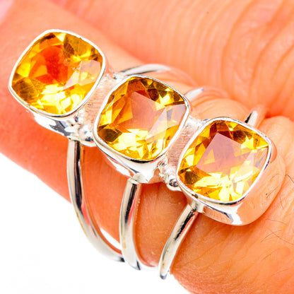Sterling silver citrine ring featuring three oval faceted yellow stones on a slim shank