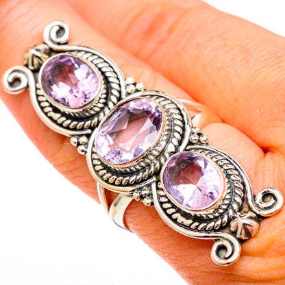925 sterling silver faceted kunzite ring with three oval light-purple stones on hand
