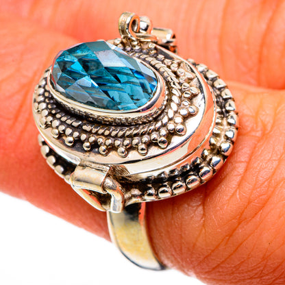 Oval blue gemstone sterling silver ring with ornate rope bezel and bead details