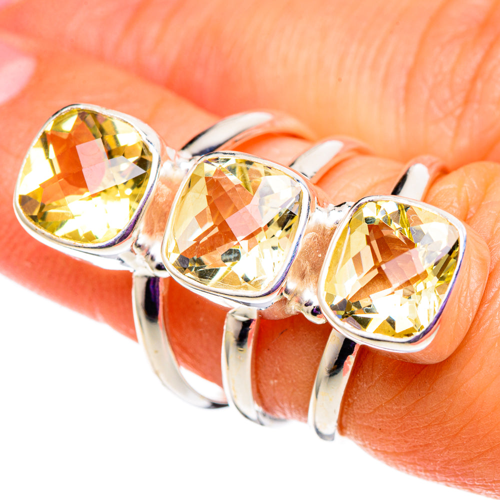 Large faceted citrine ring in 925 sterling silver with three oval yellow-gold stones