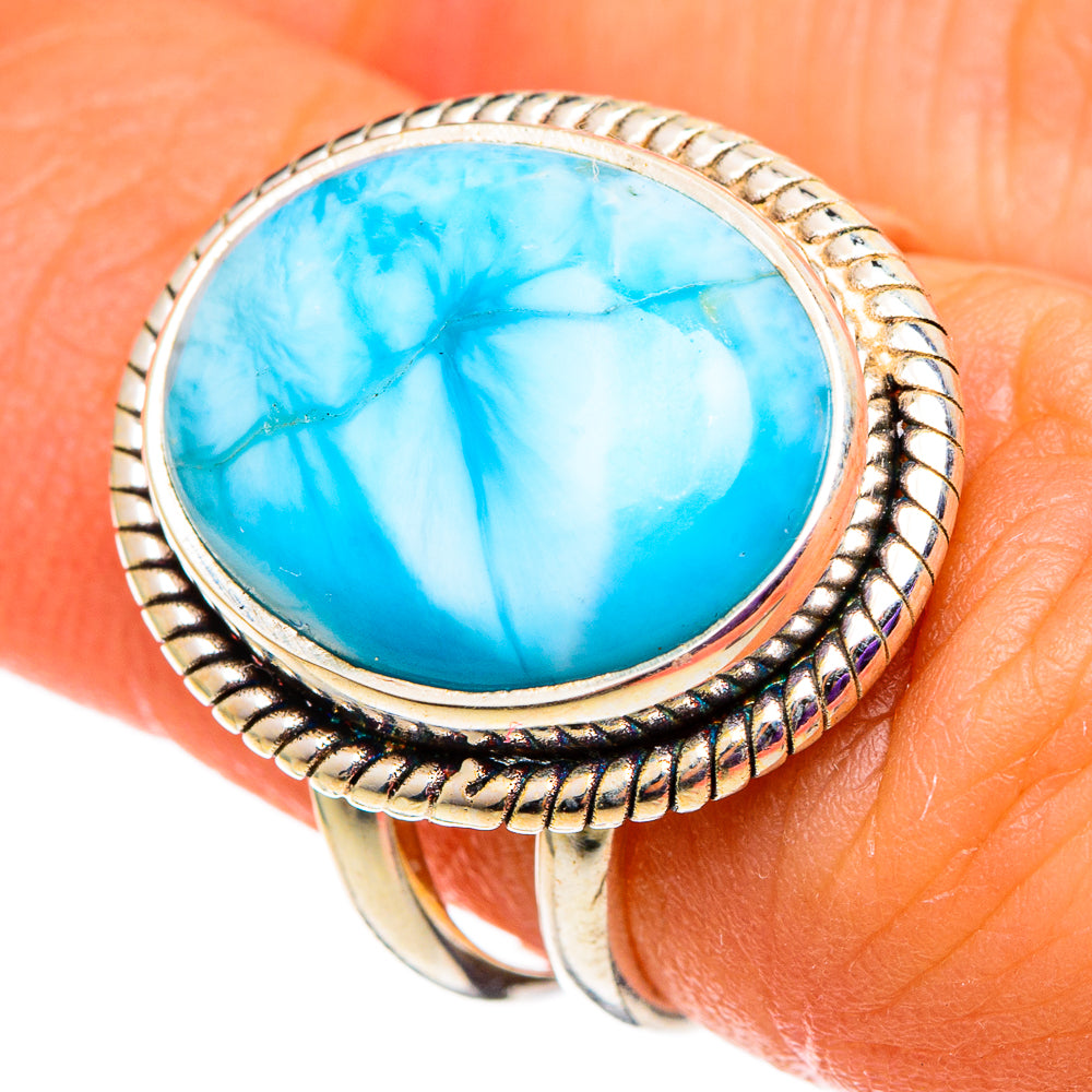 Turquoise oval gemstone ring with rope-edged sterling silver setting