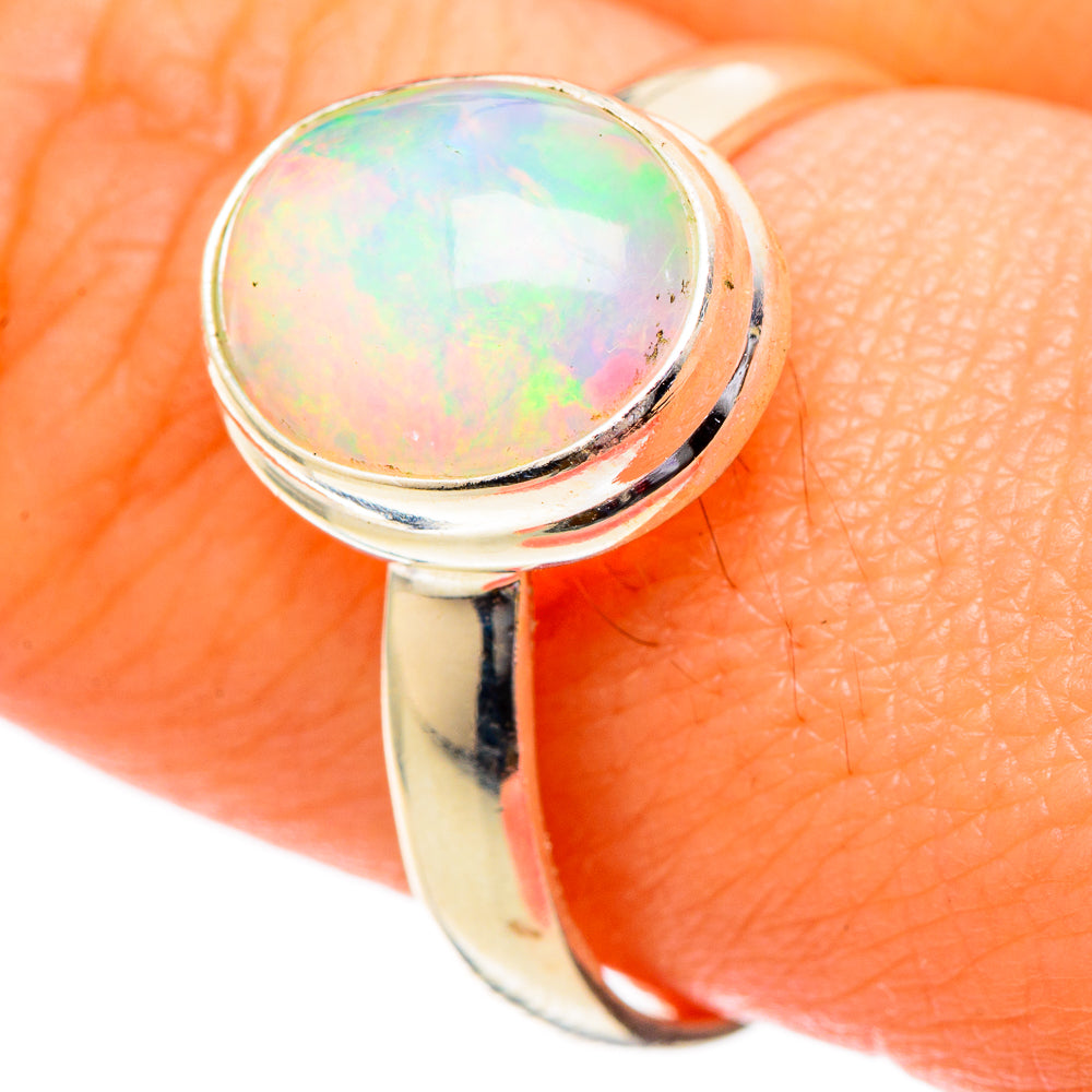 925 sterling silver opal ring with round cabochon, side view of polished band and bezel