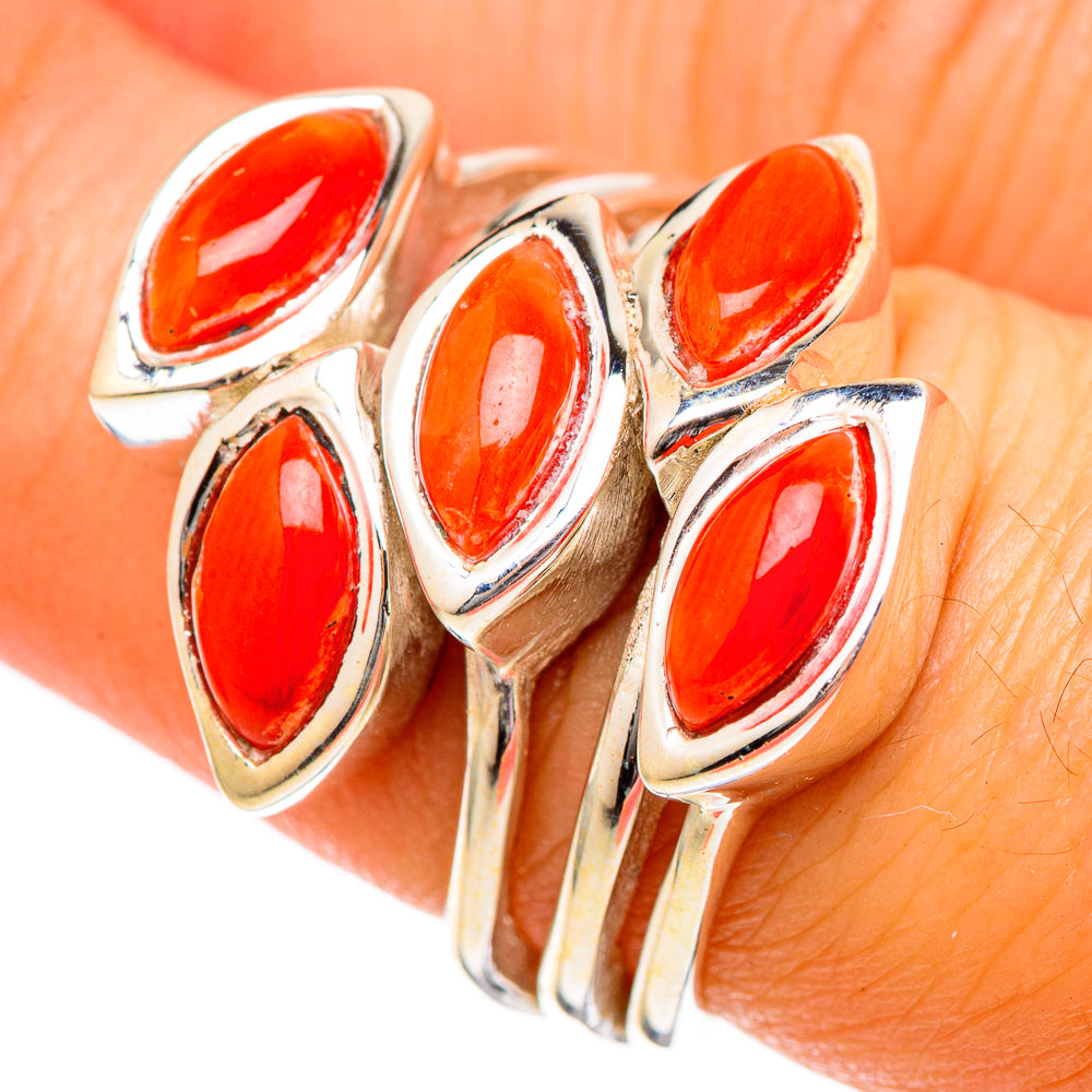 Sterling silver ring with five red coral teardrop stones, slim band