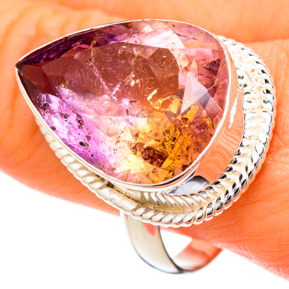 Large pear-cut ametrine gemstone ring with faceted purple and yellow stone, braided silver band