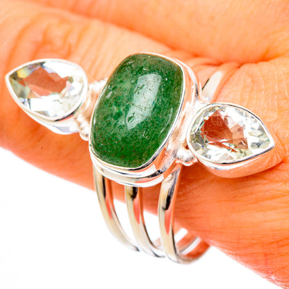Silver ring with green aventurine oval center and two clear faceted stones