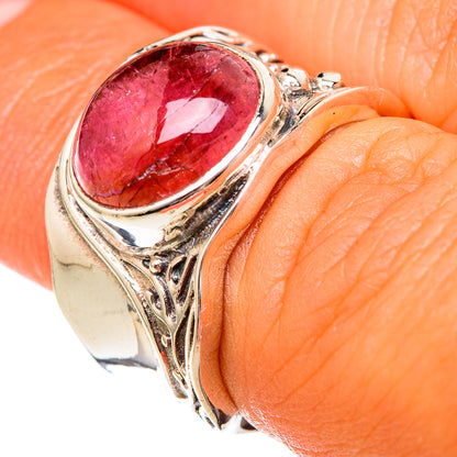 Sterling silver pink tourmaline oval ring on hand, carved decorative sides