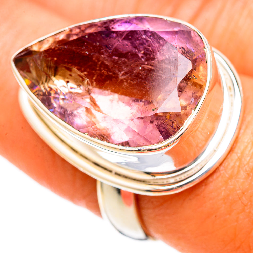 Sterling silver teardrop ametrine ring with faceted purple and golden center