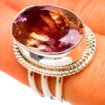 Oval faceted ametrine sterling silver ring with rope-style halo bezel
