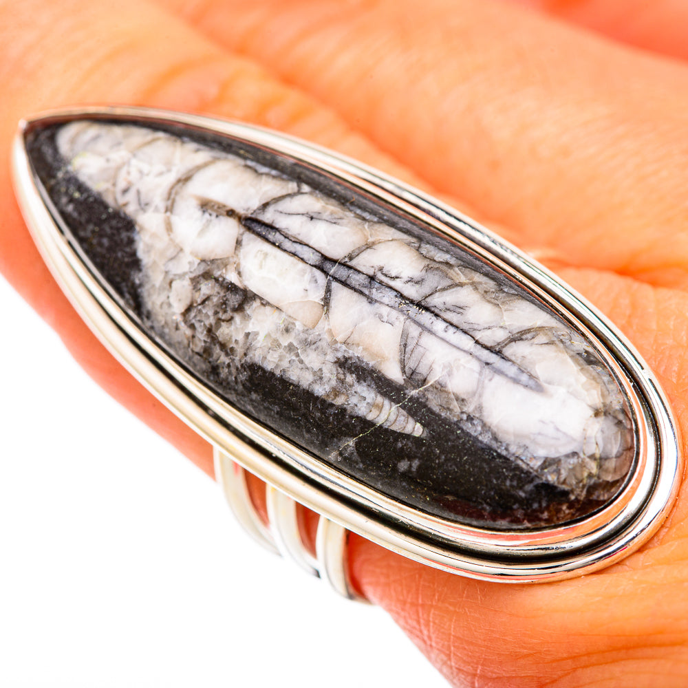 Huge oval fossil ring with black-and-white stone in sterling silver, on hand
