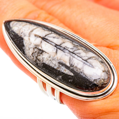 Huge oval fossil ring with black-and-white stone in sterling silver, on hand