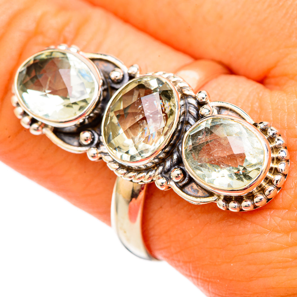 Faceted green amethyst three-stone ring with oval stones, sterling silver bezel setting