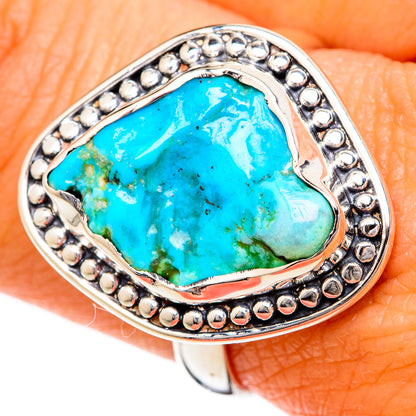 Sterling silver chrysocolla ring with large turquoise stone, silver bezel and bead trim