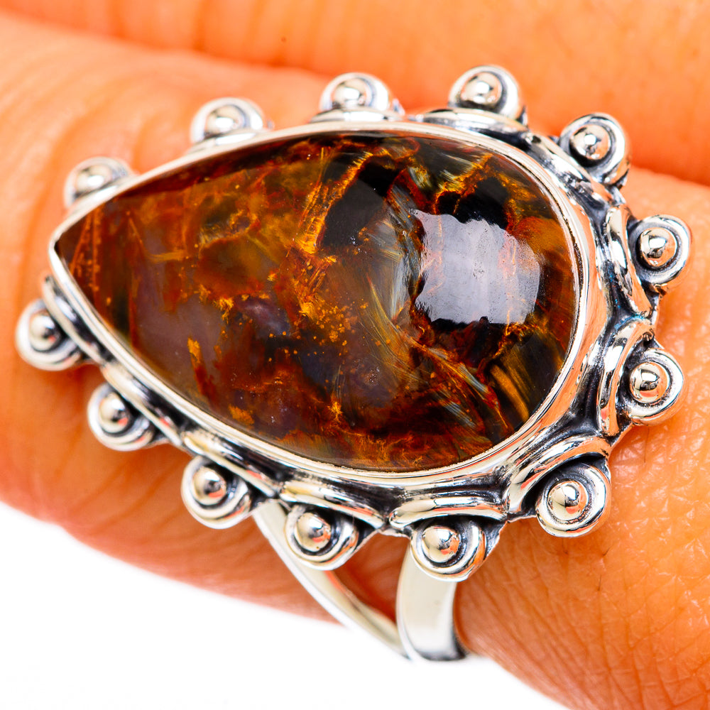 Oval amber pietersite cabochon ring in 925 sterling silver with bead-prong border