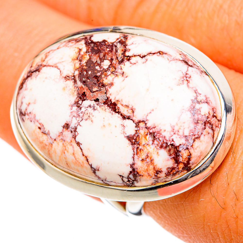 Sterling silver oval wild horse jasper ring on hand, cabochon with dark veining