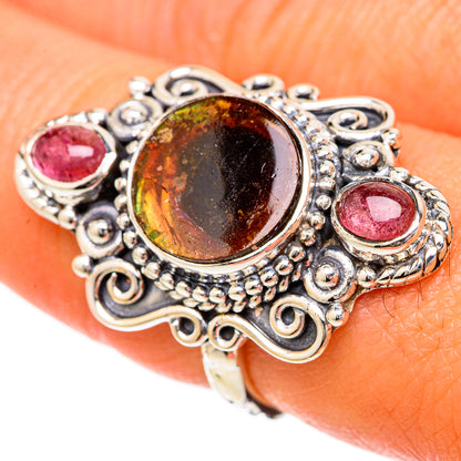 Sterling silver oval ring with dark amber watermelon tourmaline center and pink side stones