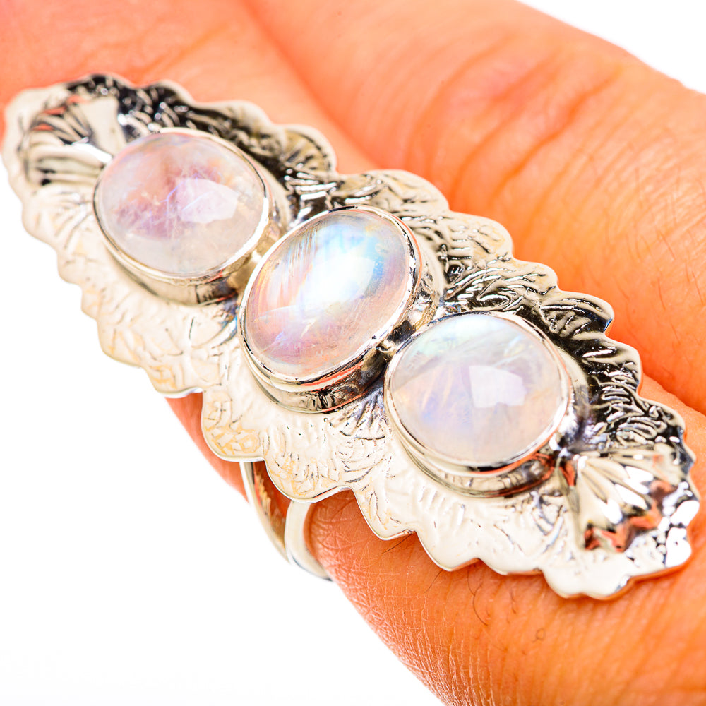 Sterling silver ring with three oval rainbow moonstone stones and ornate settings