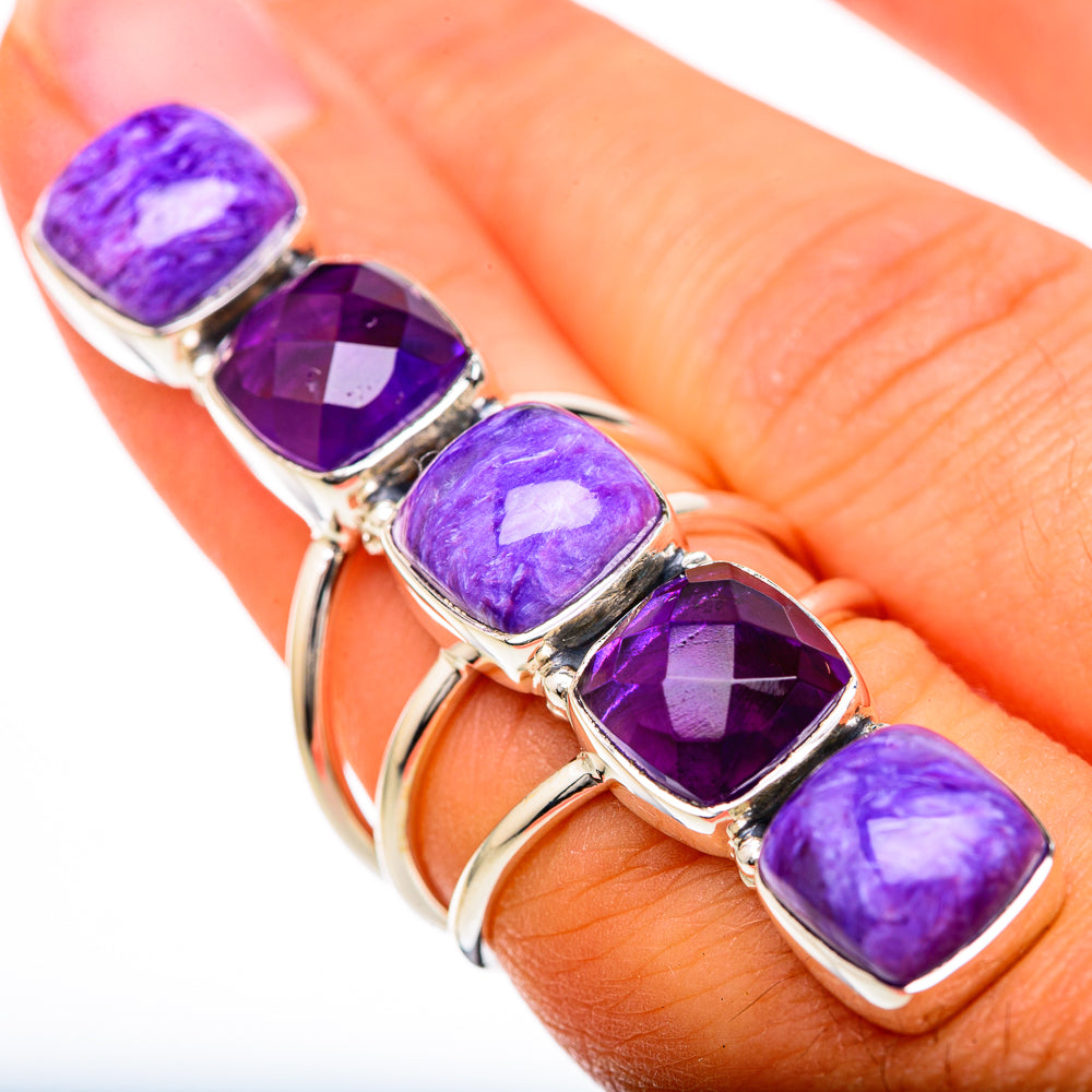 Sterling silver ring with five purple charoite gemstones on finger