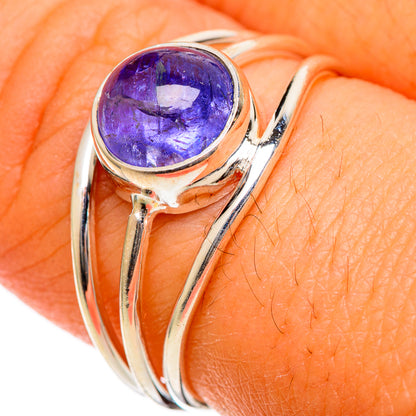 Sterling silver tanzanite ring with oval purple gemstone, split shank detail