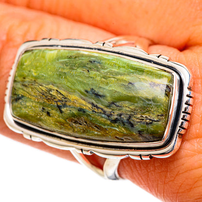 Rectangular green opal gemstone ring with 925 sterling silver bezel on finger