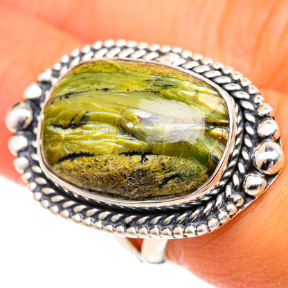 925 sterling silver ring with oval green opal cabochon and beaded bezel