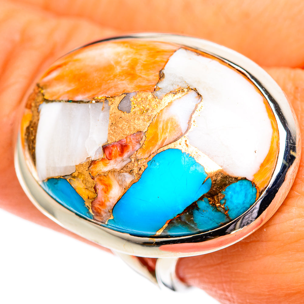 Oval turquoise oyster inlay ring, silver band with orange and white stone flashes