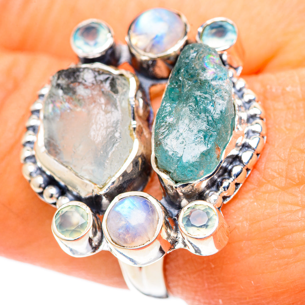 Multi-stone sterling silver ring with oval green and opal-like cabochon accents