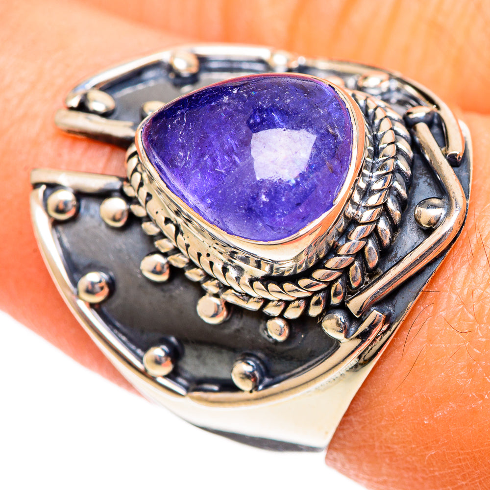 Oval purple gemstone ring, ornate sterling silver rope bezel setting