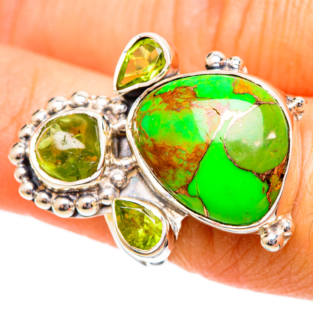 Front oval turquoise centerpiece with three green peridot-style stones in silver