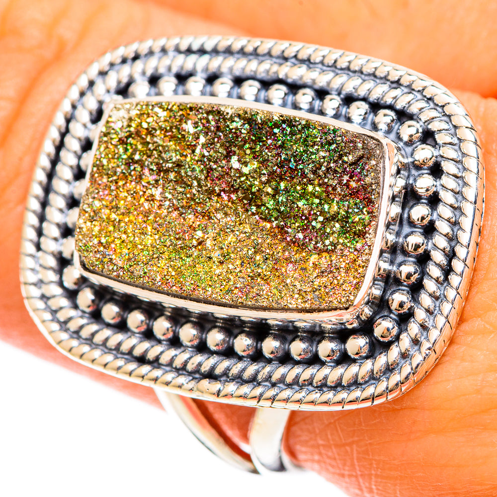 Sterling silver druzy ring with oval gold-green glitter stone and beaded bezel