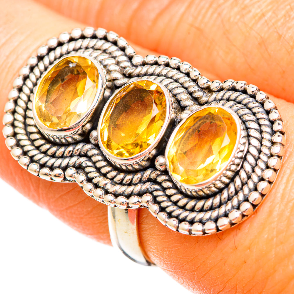 Large citrine ring: 925 sterling silver with three faceted oval yellow stones, beaded setting