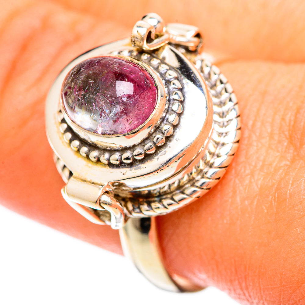 Pink tourmaline oval ring with engraved bezel and twisted-look side details
